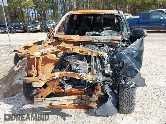 2022 Chevrolet Colorado 4WD Z71 with VIN 1GCGTDENXN1165279, listed as a IAAI auction lot 39042352 with Not provided miles and . Bid and sale history available at DreamBid. Image 6.