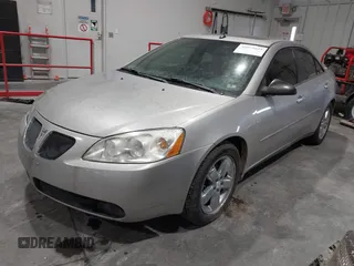 2005 Pontiac G6 GT with VIN 1G2ZH528854167162, listed as a IAAI auction lot 40973635 with 207,742 mi miles. Bid and sale history available at carsss.com. Image 2.