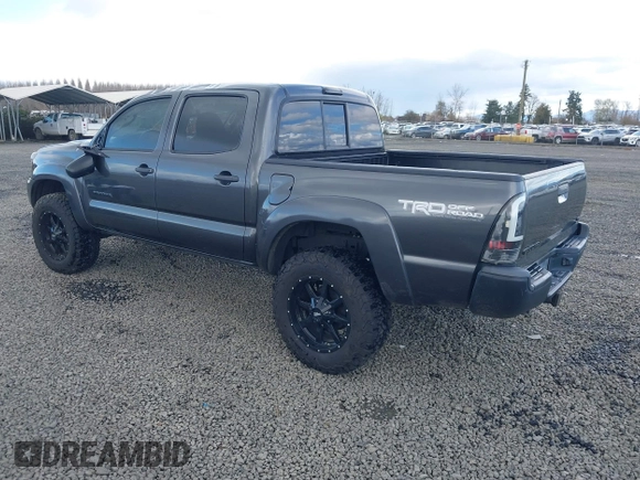 2013 Toyota Tacoma with VIN 3TMLU4ENXDM105967, listed as a IAAI auction lot 41819211 with 121,012 mi miles and . Bid and sale history available at DreamBid. Image 3.