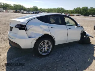 2023 Tesla Model Y Long Range with VIN 7SAYGDEE6PF861451, listed as a Copart auction lot 53133854 with 7,216 mi miles and Salvage Title. Bid and sale history available at DreamBid. Image 3.