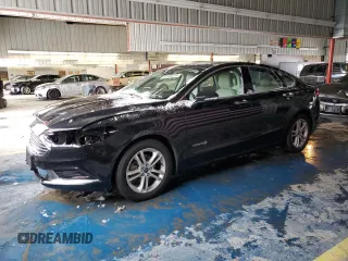 2018 Ford Fusion SE z VIN 3FA6P0LU7JR134001, wystawiony jako Copart lot #87300274 z przebiegiem 62 275 mil mil oraz Szkoda całkowita • Salvage title. Historia ofert i sprzedaży dostępna na DreamBid. Obrazek 1.