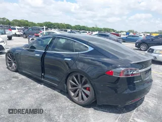 2017 Tesla Model S 100D with VIN 5YJSA1E47HF185734, listed as a IAAI auction lot 42076544 with 56,682 mi miles. Bid and sale history available at carsss.com. Image 3.