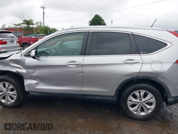 2012 Honda CR-V EX-L with VIN 2HKRM4H73CH606663, listed as a IAAI auction lot 42523931 with 132,361 mi miles and . Bid and sale history available at DreamBid. Image 14.