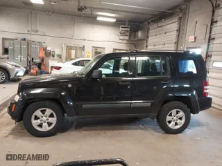 2009 Jeep Liberty Sport with VIN 1J8GN28K79W547903, listed as a IAAI auction lot 41889962 with 127,821 mi miles. Bid and sale history available at carsss.com. Image 14.