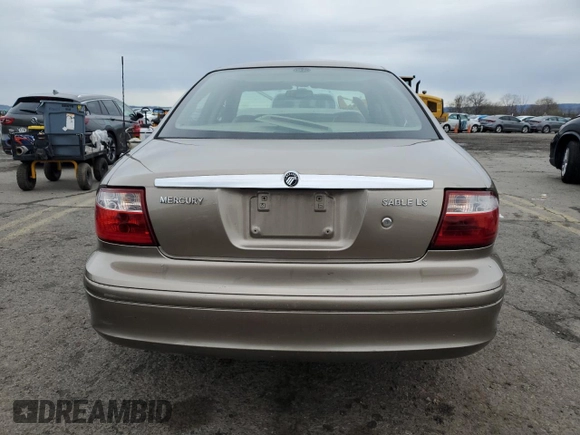 2004 Mercury Sable LS Premium с VIN 1MEFM55SX4A607611, выставлен на аукционе Copart как лот 52889395 с пробегом Не указан миль и Списание • Salvage title. История ставок и продаж доступна на DreamBid. Изображение 6.