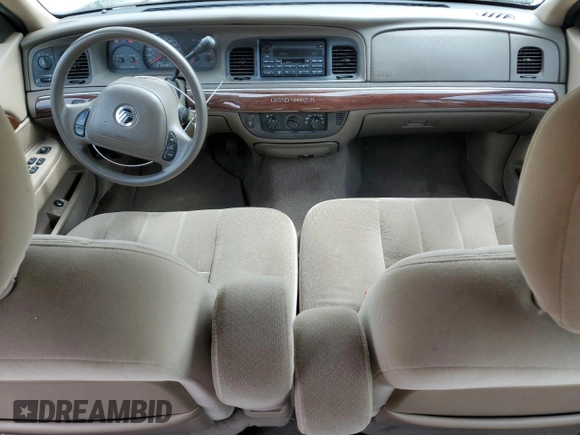 2004 Mercury Grand Marquis GS z VIN 2MEFM74W94X601693, wystawiony jako Copart lot #56303935 z przebiegiem 98 674 mil mil oraz Czysty tytuł • Clean title. Historia ofert i sprzedaży dostępna na DreamBid. Obrazek 8.
