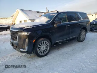 2023 Cadillac Escalade 4WD Premium Luxury z VIN 1GYS4BKL0PR189264, wystawiony jako Copart lot #42009215 z przebiegiem 59 746 mil mil oraz Tytuł czysty. Historia ofert i sprzedaży dostępna na DreamBid. Obrazek 1.