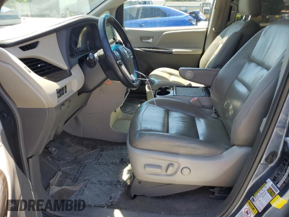 2015 Toyota Sienna XLE with VIN 5TDYK3DCXFS676402, listed as a Copart auction lot 54733845 with 173,044 mi miles and Salvage Title. Bid and sale history available at DreamBid. Image 7.