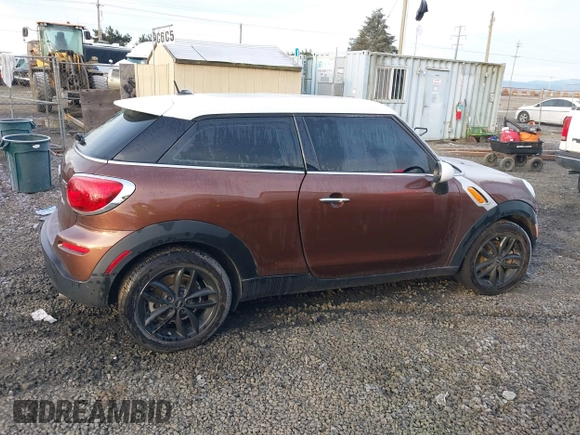 2014 MINI Paceman z VIN WMWSS1C58EWN94368, wystawiony jako IAAI lot #41377194 z przebiegiem 56 897 mil mil oraz . Historia ofert i sprzedaży dostępna na DreamBid. Obrazek 13.