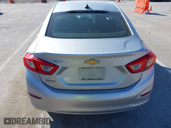 2018 Chevrolet Cruze LS with VIN 1G1BC5SMXJ7131242, listed as a IAAI auction lot 41754160 with 71,488 mi miles and . Bid and sale history available at DreamBid. Image 17.