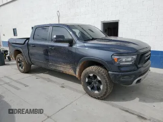 2020 Ram 1500 Rebel with VIN 1C6SRFLTXLN118580, listed as a Copart auction lot 54585955 with 39,028 mi miles and Salvage title. Bid and sale history available at DreamBid. Image 4.