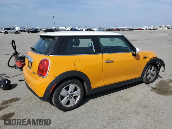 2014 MINI Hardtop with VIN WMWXM5C58ET933445, listed as a Copart auction lot 52769425 with 55,391 mi miles and Salvage Title. Bid and sale history available at DreamBid. Image 3.