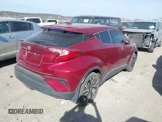 2018 Toyota C-HR XLE with VIN NMTKHMBX3JR059057, listed as a IAAI auction lot 41810801 with 124,246 mi miles. Bid and sale history available at carsss.com. Image 4.