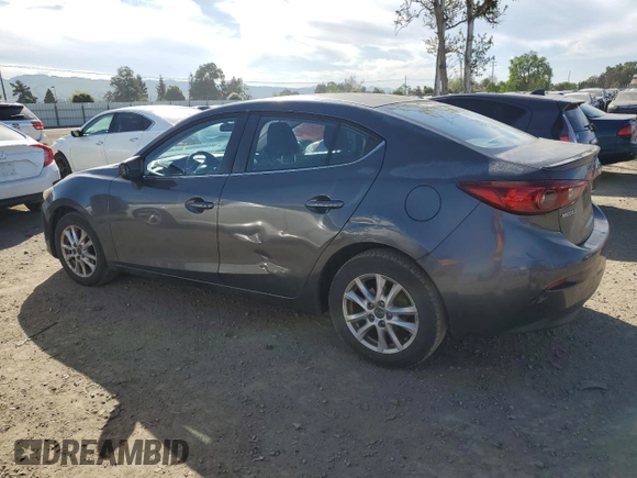 2014 Mazda 3 i Touring with VIN JM1BM1V74E1110673, listed as a Copart auction lot 52985505 with 86,032 mi miles and Salvage Title. Bid and sale history available at DreamBid. Image 2.
