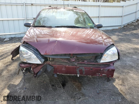 2007 Ford Focus SE with VIN 1FAFP36N87W183509, listed as a Copart auction lot 54649255 with 156,260 mi miles and Salvage title. Bid and sale history available at DreamBid. Image 5.