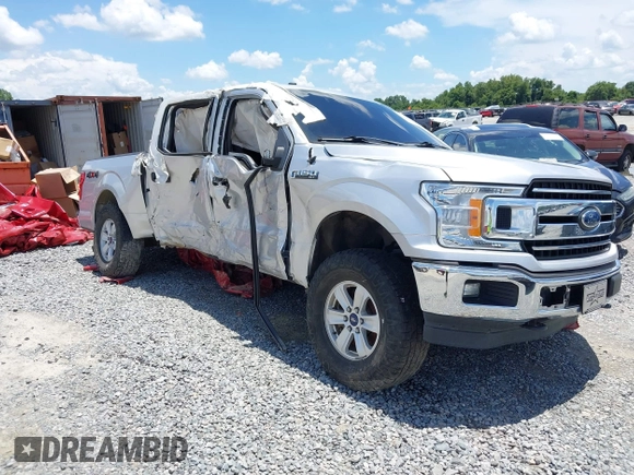 2018 Ford F-150 XL with VIN 1FTEW1EG6JFD14007, listed as a IAAI auction lot 36180966 with 124,521 mi miles and . Bid and sale history available at DreamBid. Image 1.