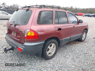 2002 Hyundai Santa Fe GLS with VIN KM8SC73D72U306997, listed as a IAAI auction lot 41519773 with 244,398 mi miles. Bid and sale history available at carsss.com. Image 4.