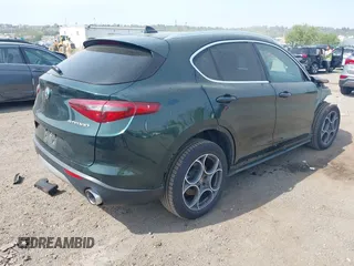 2018 Alfa Romeo Stelvio z VIN ZASFAKAN7J7B99545, wystawiony jako IAAI lot #42117271 z przebiegiem 49 368 mil mil oraz . Historia ofert i sprzedaży dostępna na DreamBid. Obrazek 4.