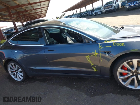 2018 Tesla Model 3 Long Range Battery z VIN 5YJ3E1EB6JF105837, wystawiony jako IAAI lot #41763460 z przebiegiem 100 387 mil mil oraz . Historia ofert i sprzedaży dostępna na DreamBid. Obrazek 13.