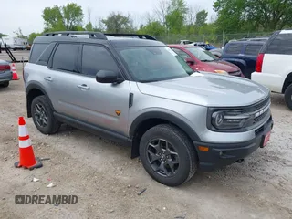 2021 Ford Bronco Sport Badlands z VIN 3FMCR9D99MRA67830, wystawiony jako IAAI lot #42318934 z przebiegiem 129 598 mil mil oraz . Historia ofert i sprzedaży dostępna na DreamBid. Obrazek 1.