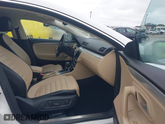 2016 Volkswagen CC Sport with VIN WVWBN7AN4GE512547, listed as a IAAI auction lot 40802001 with 94,513 mi miles. Bid and sale history available at carsss.com. Image 5.