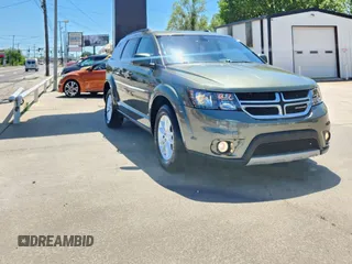 2017 Dodge Journey SXT with VIN 3C4PDCBG4HT598882, listed as a Copart auction lot 56783495 with 89,771 mi miles and Salvage Title. Bid and sale history available at DreamBid. Image 5.