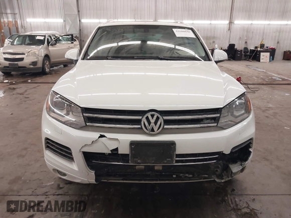 2013 Volkswagen Touareg Lux with VIN WVGEF9BP5DD011511, listed as a IAAI auction lot 41608840 with 167,350 mi miles and . Bid and sale history available at DreamBid. Image 13.