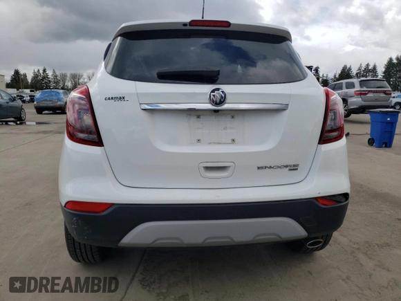 2020 Buick Encore Essence z VIN KL4CJGSB7LB057428, wystawiony jako Copart lot #49545085 z przebiegiem 72 644 mil mil oraz Szkody całkowita. Historia ofert i sprzedaży dostępna na DreamBid. Obrazek 6.