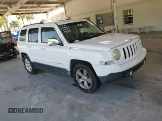 2014 Jeep Patriot High Altitude with VIN 1C4NJPFA1ED653402, listed as a IAAI auction lot 42371410 with 165,459 mi miles and . Bid and sale history available at DreamBid. Image 1.