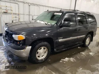 2004 GMC Yukon SLE with VIN 1GKEK13Z44J123899, listed as a Copart auction lot 86372974 with 201,093 mi miles and Salvage Title. Bid and sale history available at carsss.com. Image 1.
