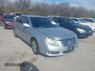 2008 Toyota Avalon XL with VIN 4T1BK36B38U281031, listed as a IAAI auction lot 41268774 with 303,156 mi miles. Bid and sale history available at carsss.com. Image 1.
