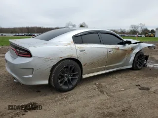 2021 Dodge Charger R/T with VIN 2C3CDXCT7MH594513, listed as a Copart auction lot 52482085 with 62,694 mi miles and Salvage Title. Bid and sale history available at carsss.com. Image 3.