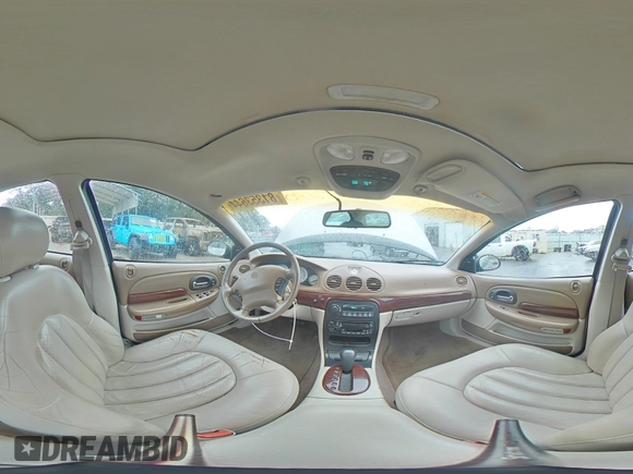1999 Chrysler LHS z VIN 2C3HC56G9XH685301, wystawiony jako Copart lot #81353644 z przebiegiem 184 656 mil mil oraz Szkody całkowita. Historia ofert i sprzedaży dostępna na DreamBid. Obrazek 12.