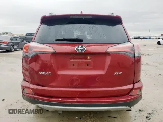 2018 Toyota RAV4 XLE with VIN 2T3WFREV7JW429781, listed as a Copart auction lot 51759485 with 72,792 mi miles and Salvage Title. Bid and sale history available at DreamBid. Image 6.