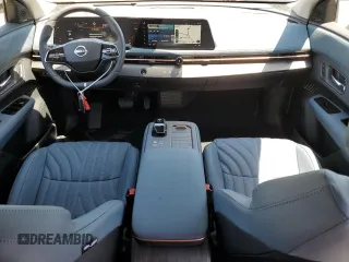 2023 Nissan ARIYA Platinum+ z VIN JN1DF0CD8PM703169, wystawiony jako Copart lot #63199963 z przebiegiem 14 mil mil oraz . Historia ofert i sprzedaży dostępna na DreamBid. Obrazek 8.