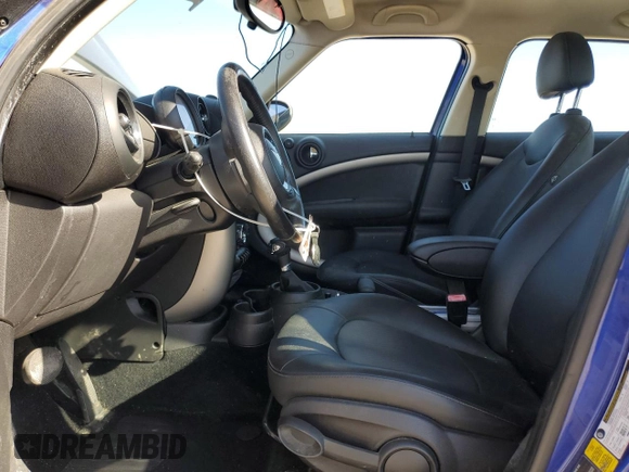 2015 MINI Countryman with VIN WMWZB3C53FWR44727, listed as a Copart auction lot 49456945 with 89,381 mi miles and Salvage Title. Bid and sale history available at DreamBid. Image 7.