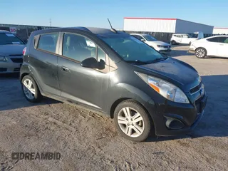 2015 Chevrolet Spark LS with VIN KL8CB6S91FC813093, listed as a IAAI auction lot 41408950 with 99,223 mi miles and . Bid and sale history available at DreamBid. Image 1.