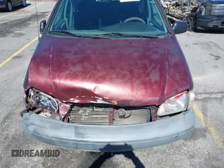 1999 Toyota Sienna LE with VIN 4T3ZF13C1XU112717, listed as a IAAI auction lot 41725827 with 272,639 mi miles. Bid and sale history available at carsss.com. Image 6.