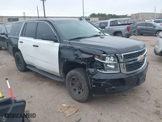2018 Chevrolet Tahoe Commercial with VIN 1GNLCDEC1JR312458, listed as a IAAI auction lot 41371563 with 114,086 mi miles. Bid and sale history available at carsss.com. Image 1.