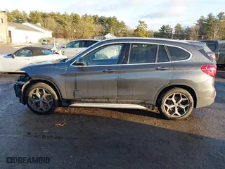 2016 BMW X1 xDrive28i with VIN WBXHT3C30GP881837, listed as a IAAI auction lot 41117389 with 84,157 mi miles. Bid and sale history available at carsss.com. Image 15.