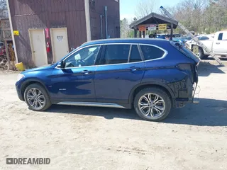 2017 BMW X1 xDrive28i with VIN WBXHT3C33H5F82035, listed as a IAAI auction lot 41944399 with 102,942 mi miles. Bid and sale history available at carsss.com. Image 14.