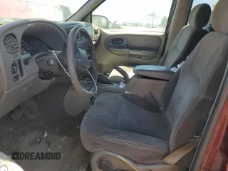 2004 Chevrolet TrailBlazer LS with VIN 1GNDT13S342444373, listed as a Copart auction lot 55796795 with 209,120 mi miles and Salvage Title. Bid and sale history available at DreamBid. Image 7.