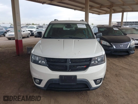 2019 Dodge Journey SE with VIN 3C4PDCBB7KT797842, listed as a IAAI auction lot 42036147 with 163,919 mi miles and . Bid and sale history available at DreamBid. Image 12.