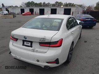 2021 BMW 3 Series 330i xDrive with VIN 3MW5R7J03M8B65004, listed as a IAAI auction lot 41244134 with Not Provided miles and . Bid and sale history available at DreamBid. Image 4.