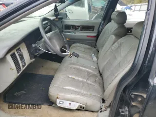 1996 Cadillac Fleetwood z VIN 1G6DW52P7TR710605, wystawiony jako Copart lot #51814605 z przebiegiem 280 654 mil mil oraz Nie do naprawy • Non repairable. Historia ofert i sprzedaży dostępna na DreamBid. Obrazek 7.