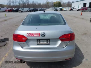 2014 Volkswagen Jetta TDI w/Premium/Nav z VIN 3VWLL7AJ3EM332617, wystawiony jako IAAI lot #42033000 z przebiegiem 186 444 mil mil oraz . Historia ofert i sprzedaży dostępna na DreamBid. Obrazek 16.