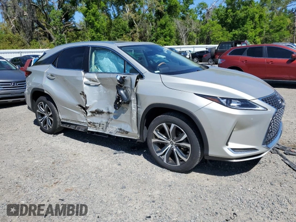 2020 Lexus RX with VIN 2T2HZMAA1LC163074, listed as a Copart auction lot 49232765 with 26,702 mi miles and Salvage Title. Bid and sale history available at carsss.com. Image 4.
