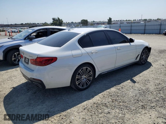 2020 BMW 5 Series 530e with VIN WBAJA9C03LCD28842, listed as a Copart auction lot 69901984 with 63,036 mi miles and Salvage Title. Bid and sale history available at DreamBid. Image 3.