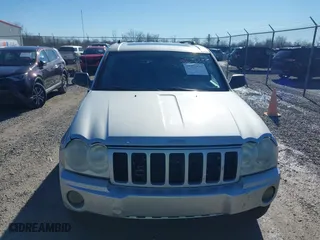 2005 Jeep Grand Cherokee Laredo with VIN 1J4HR48N65C537469, listed as a IAAI auction lot 41676555 with 226,084 mi miles. Bid and sale history available at carsss.com. Image 6.