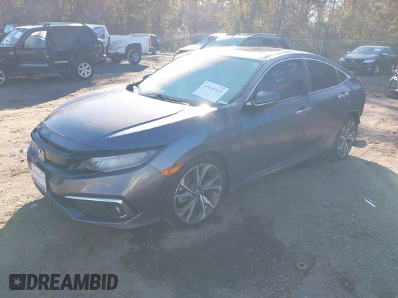 2020 Honda Civic Sedan Touring with VIN 19XFC1F97LE001901, listed as a IAAI auction lot 41048129 with 67,027 mi miles. Bid and sale history available at carsss.com. Image 17.